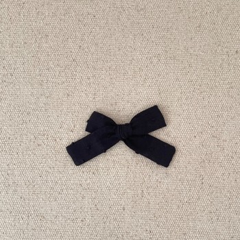 Petit noeud plumetis noir